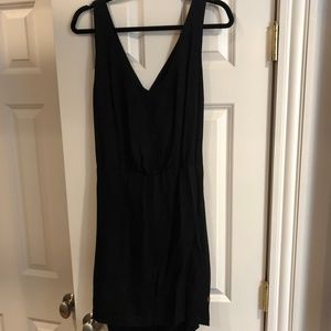 Black cocktail dress with cut-out back